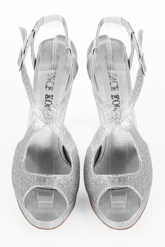 Light silver women's open back sandals, with crossed straps. Round toe. Very high slim heel with a platform at the front. Top view - Florence KOOIJMAN